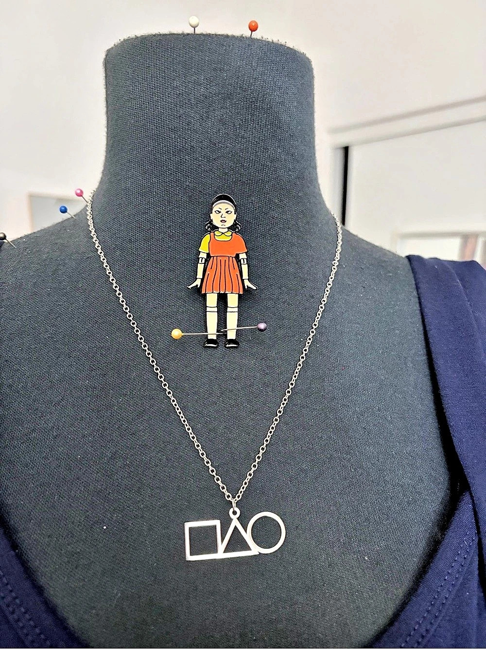 Squid Games doll pin and necklace